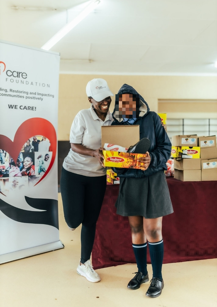 Laptop donation to Nelmapius High School