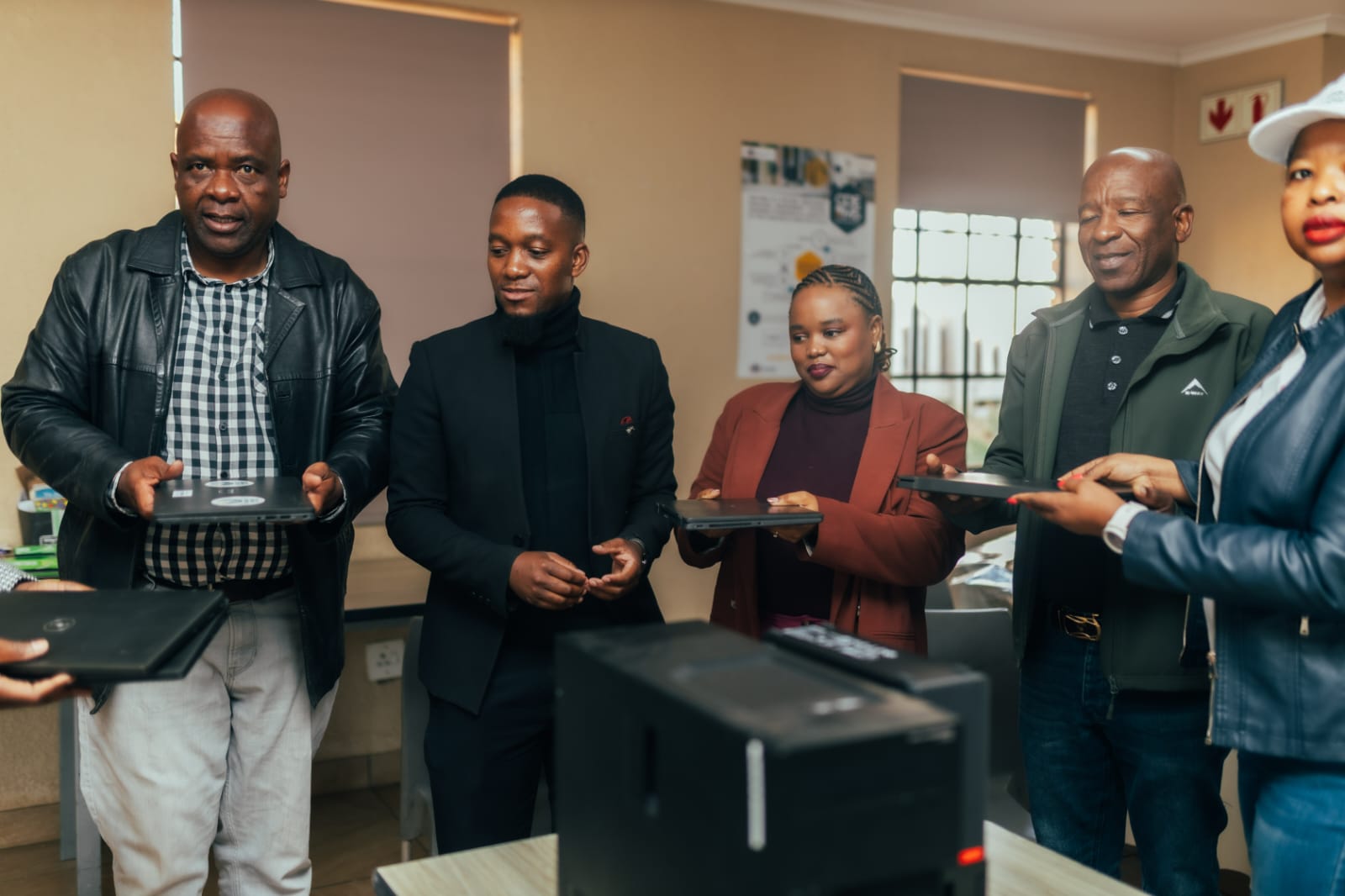 Laptop donation to Nelmapius High School