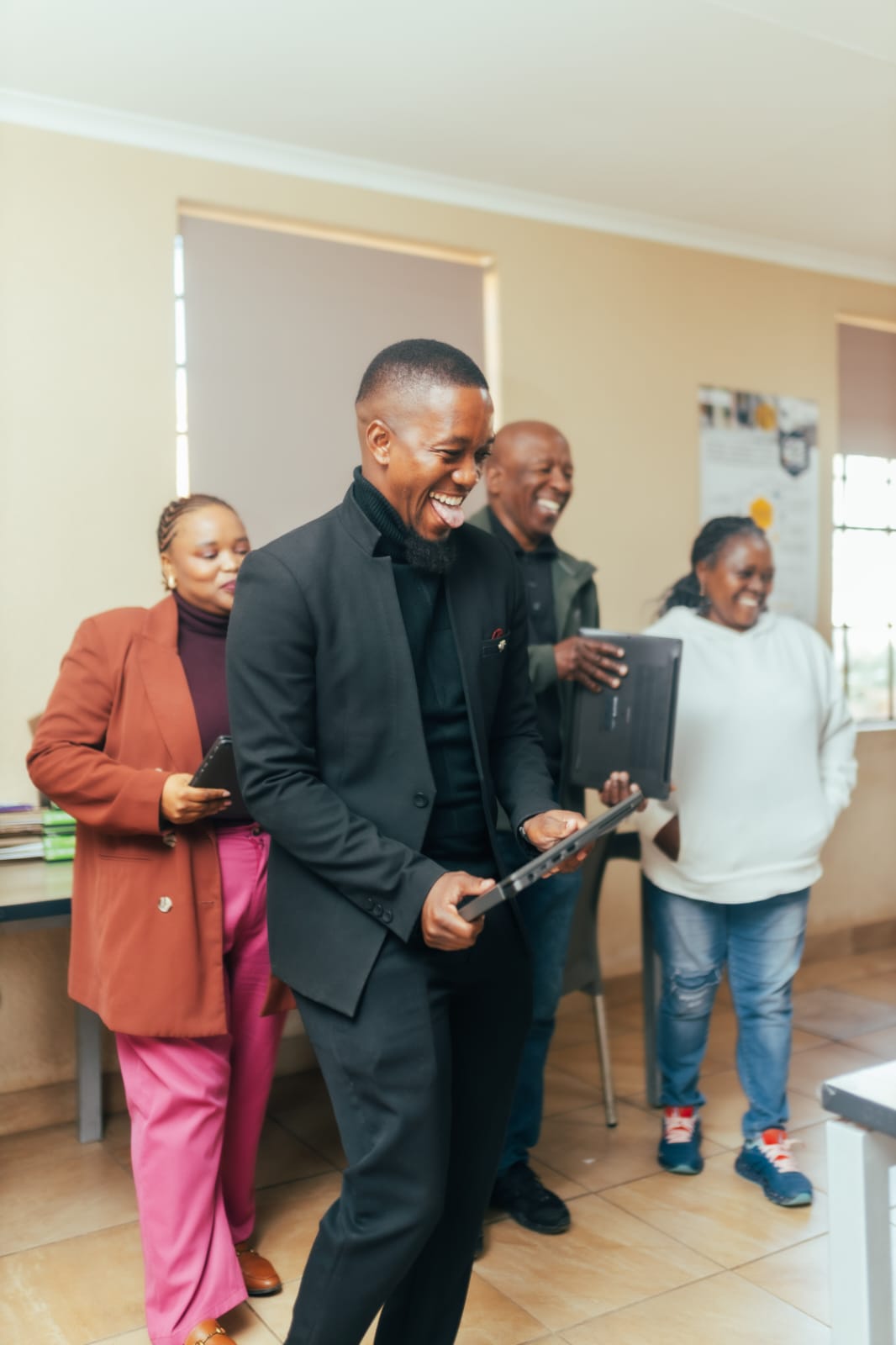 Laptop donation to Nelmapius High School